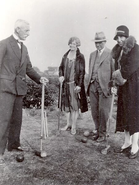 Group of people playing croquet, c1902s