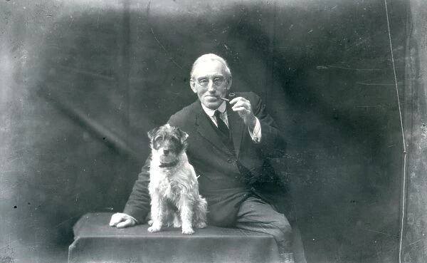 Portrait of elderly gentleman with his dog, December 1928