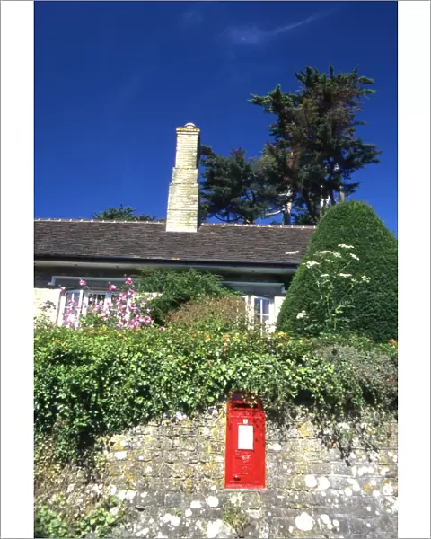 Traditional red post box at Bignor, West Sussex