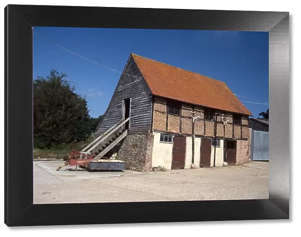 Wooden and brick barn at Bailing Hill Farm, Warnham, West Sussex