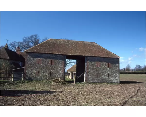 Flint and brick barn at Riverhill Farm, Byworth, Fittleworth, West Sussex