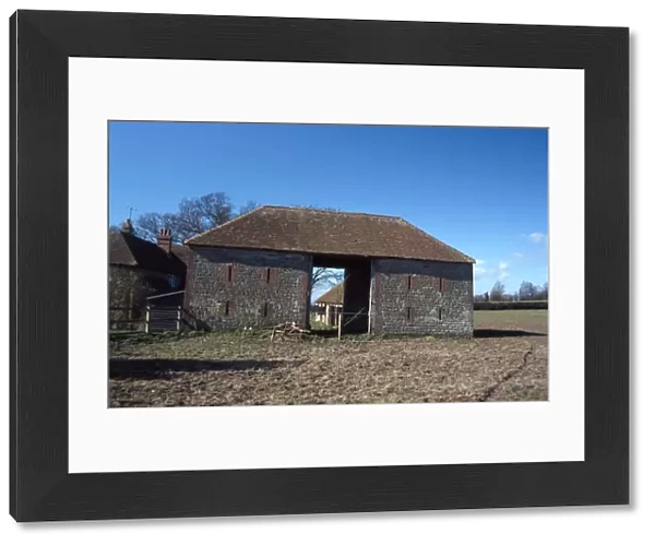 Flint and brick barn at Riverhill Farm, Byworth, Fittleworth, West Sussex
