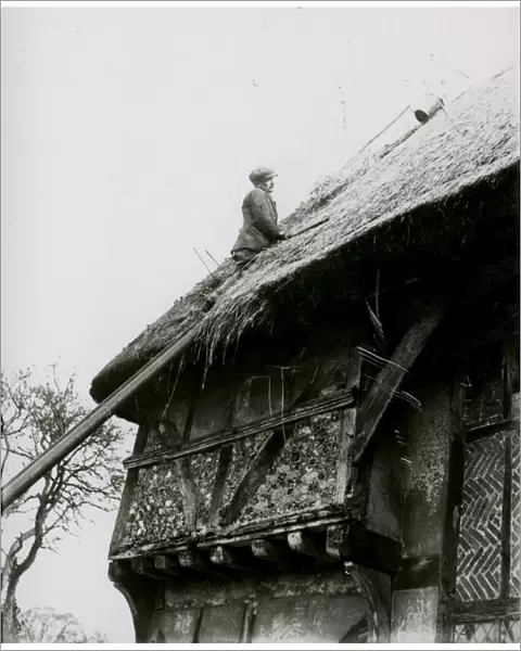 Roof thatching on Bignor General Shop, February 1938