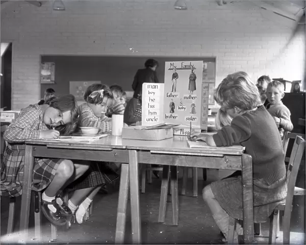 Children having a lesson at Lancastrian Infants School, Chichester, May 1956