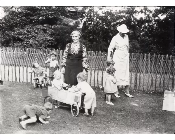 Very young children playing in Petworth House Garden, September 1939