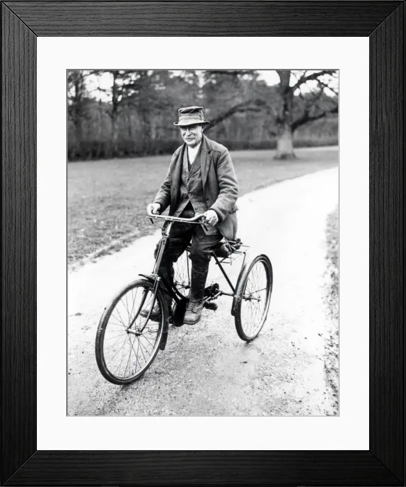 Framed Print : Countryman riding a Tricycle - December 1938 Framed Print : Countryman riding a Tricycle - December 1938