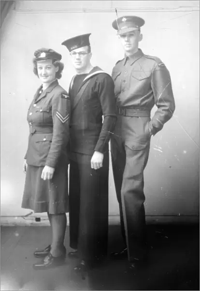 Portrait of three friends in uniform - April 1944