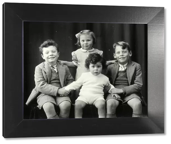 Family portrait of four children - 5 December 1945