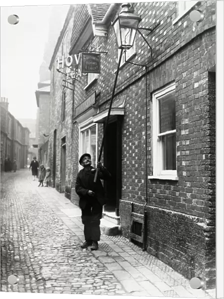 Lamplighter in Lombard St. Petworth, 1931