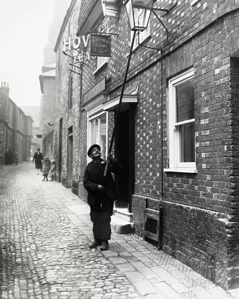 Lamplighter in Lombard St. Petworth, 1931
