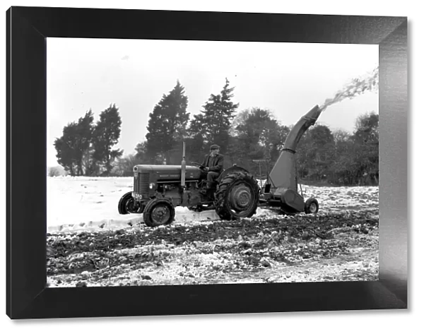 Tractor clearing snow on farm, 29 January 1963