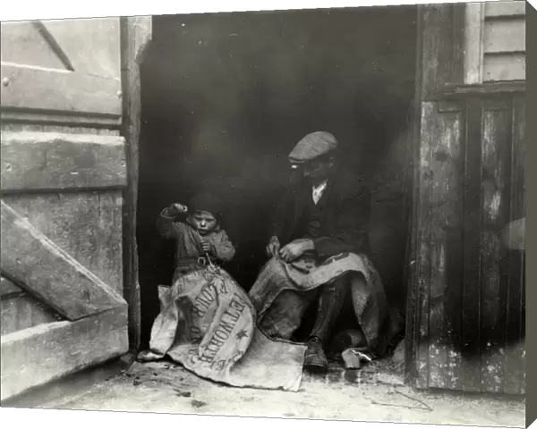 Sack mending, a slack time job on the farm, 1933