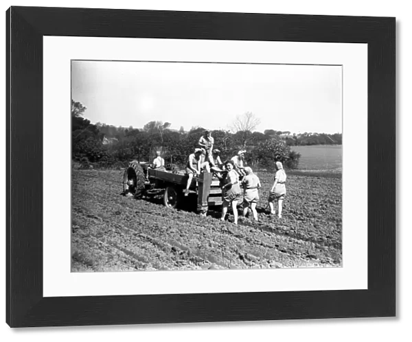 Potato planting at Todhurst, Kirdford with Land Girls, May 1943
