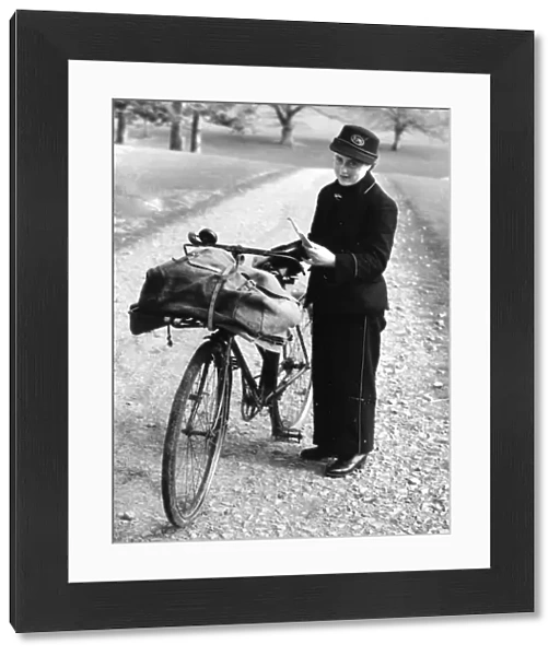 Lady postman with bike and letter bag, 22 March 1945