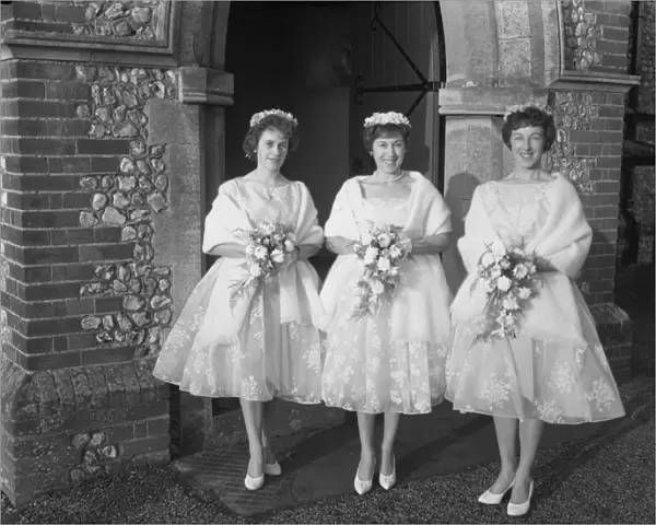 3 Bridesmaids outside Church