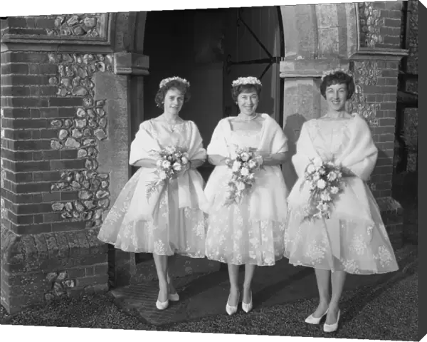 3 Bridesmaids outside Church