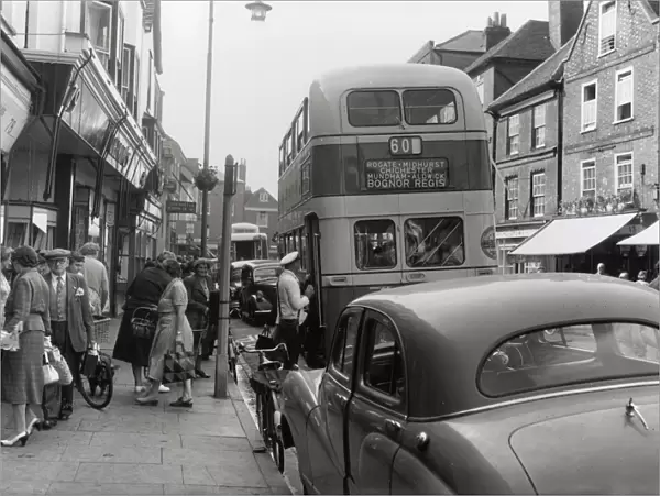 Southdown Bus with traffic and passers-by