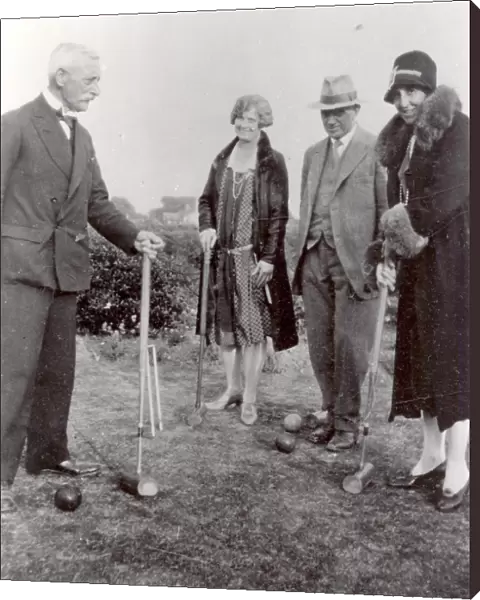 Group of people playing croquet, c1902s