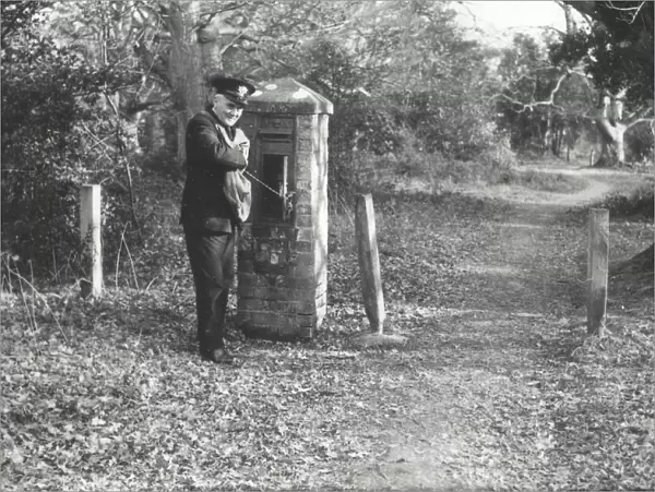 Postman emptying the letterbox, 1960