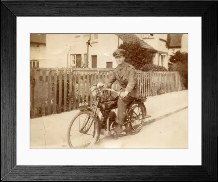Framed Print : Young man in military uniform on motorbike, c1920s Framed Print : Young man in military uniform on motorbike, c1920s