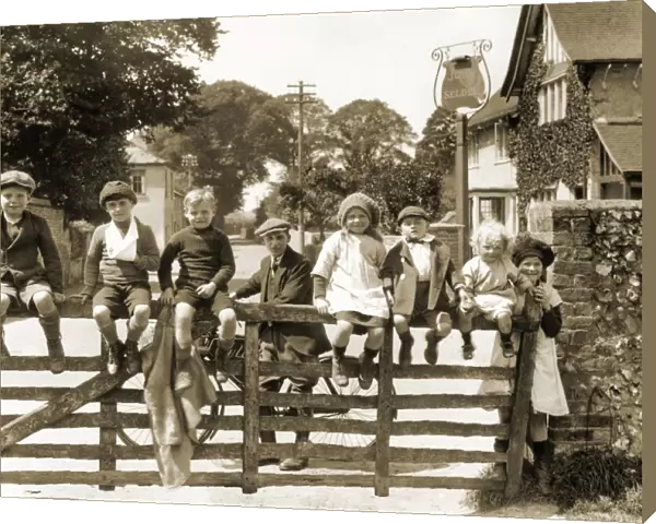 Children sit on a gate, Salvington Road, Durrington, Worthing