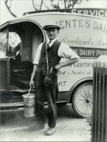 Fuentes Dairyman outside his vehicle, early 20th century