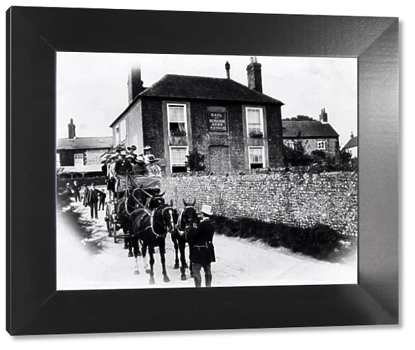 Coach and horses outside Earl of Newburgh Arms, Slindon. c 1900