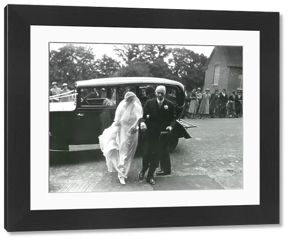Bride with father arriving at the church, June 1936