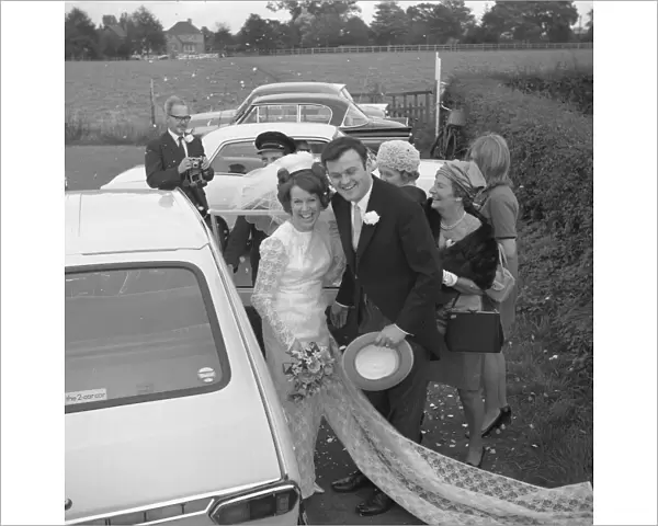 The bridge and groom with guests, 1960s