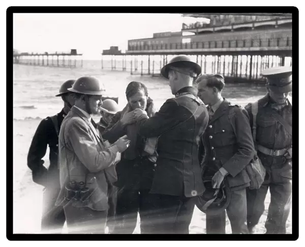 Sgt Babbage lighting a cigarette, Bognor, 26 Aug 1940