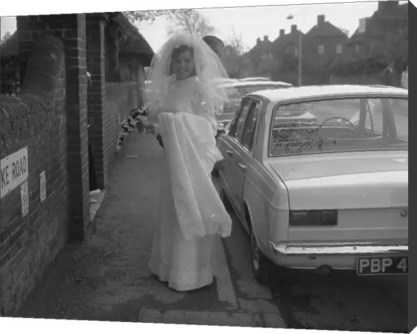 Bride outside St Marys Church, Whyke, Chichester