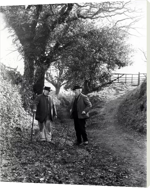 Two country gentlemen chatting in country lane, Upperton, Sussex