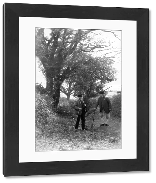 Two gentlemen chatting in country lane at Upperton, Sussex, c1935