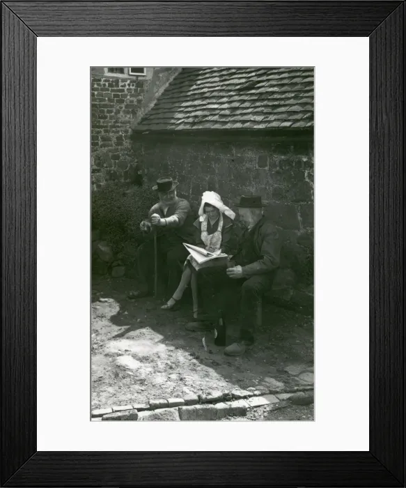 Framed Print : Three country folk discussing the news in a newspaper, Upperton, Sussex Framed Print : Three country folk discussing the news in a newspaper, Upperton, Sussex