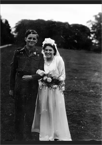 Bride and Groom at Ebernoe, Groom in army uniform, 1940s