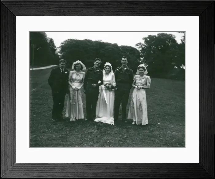 Framed Print : Wedding party posing in church grounds at Ebernoe, Sussex, 1940s Framed Print : Wedding party posing in church grounds at Ebernoe, Sussex, 1940s