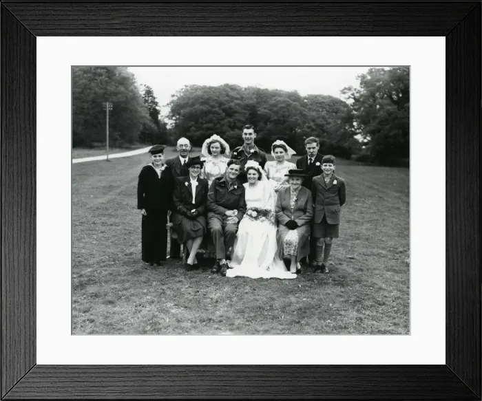 Framed Print : Family group with bride and groom at a wedding in Ebernoe, 1940s Framed Print : Family group with bride and groom at a wedding in Ebernoe, 1940s