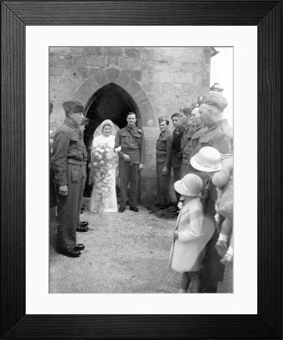 Framed Print : Bride and Groom outstide church in Sussex, June 1941 Framed Print : Bride and Groom outstide church in Sussex, June 1941