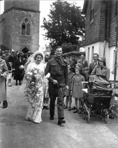 Bride and Groom walking down church path, June 1941