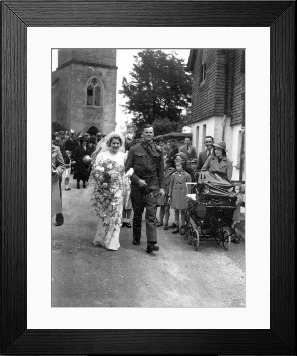 Framed Print : Bride and Groom walking down church path, June 1941 Framed Print : Bride and Groom walking down church path, June 1941