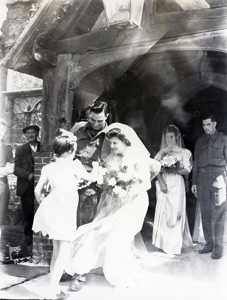 Bride and Groom outside Kirdford church, 1945