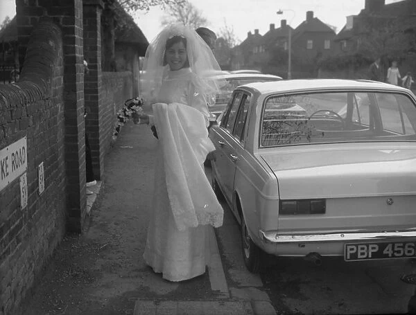 Bride outside St Marys Church, Whyke, Chichester
