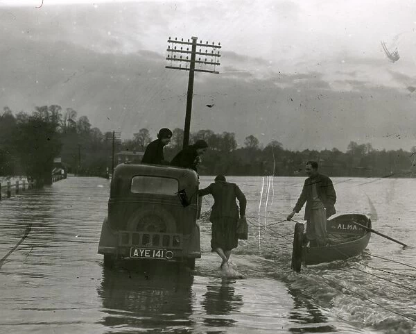 Car stuck in floods at Pulborough, December 1934
