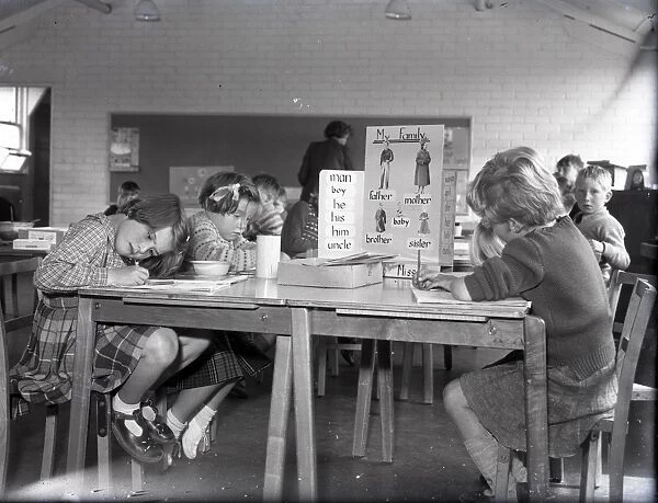 Children having a lesson at Lancastrian Infants School, Chichester, May 1956