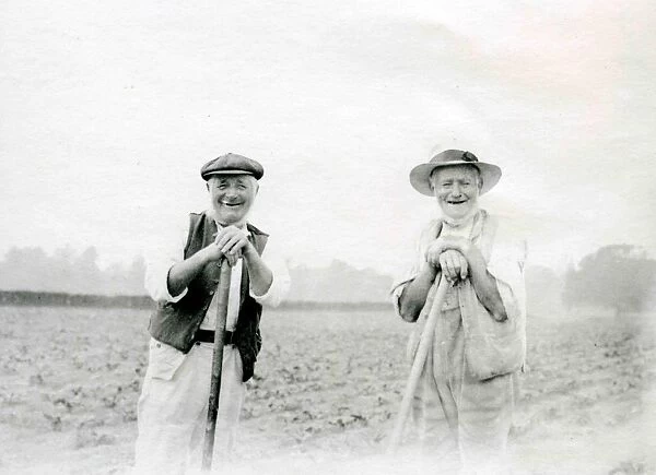 Two county folk in a field
