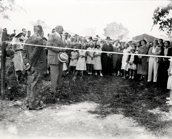 Cutting the tape ceremony at event in Sussex, December 1935