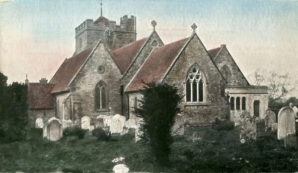 East Hoathly Church. Coloured post card of exterior of church and churchyard