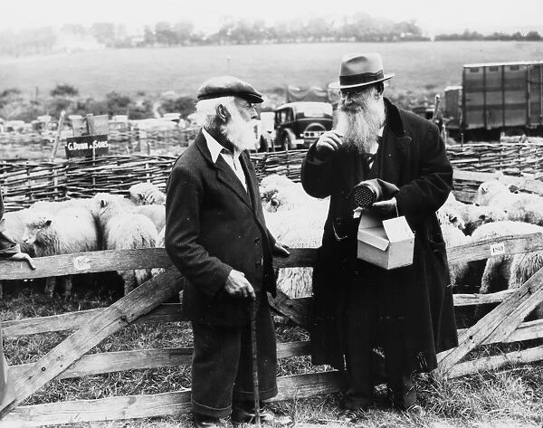 Two elderly gentlemen at Findon Sheep Fair, Sussex