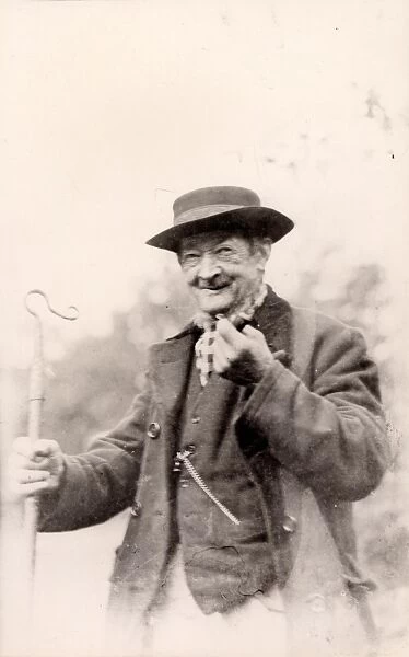 Elderly shepherd with crook, 1925