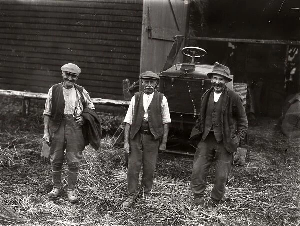 Farm workers with tractor